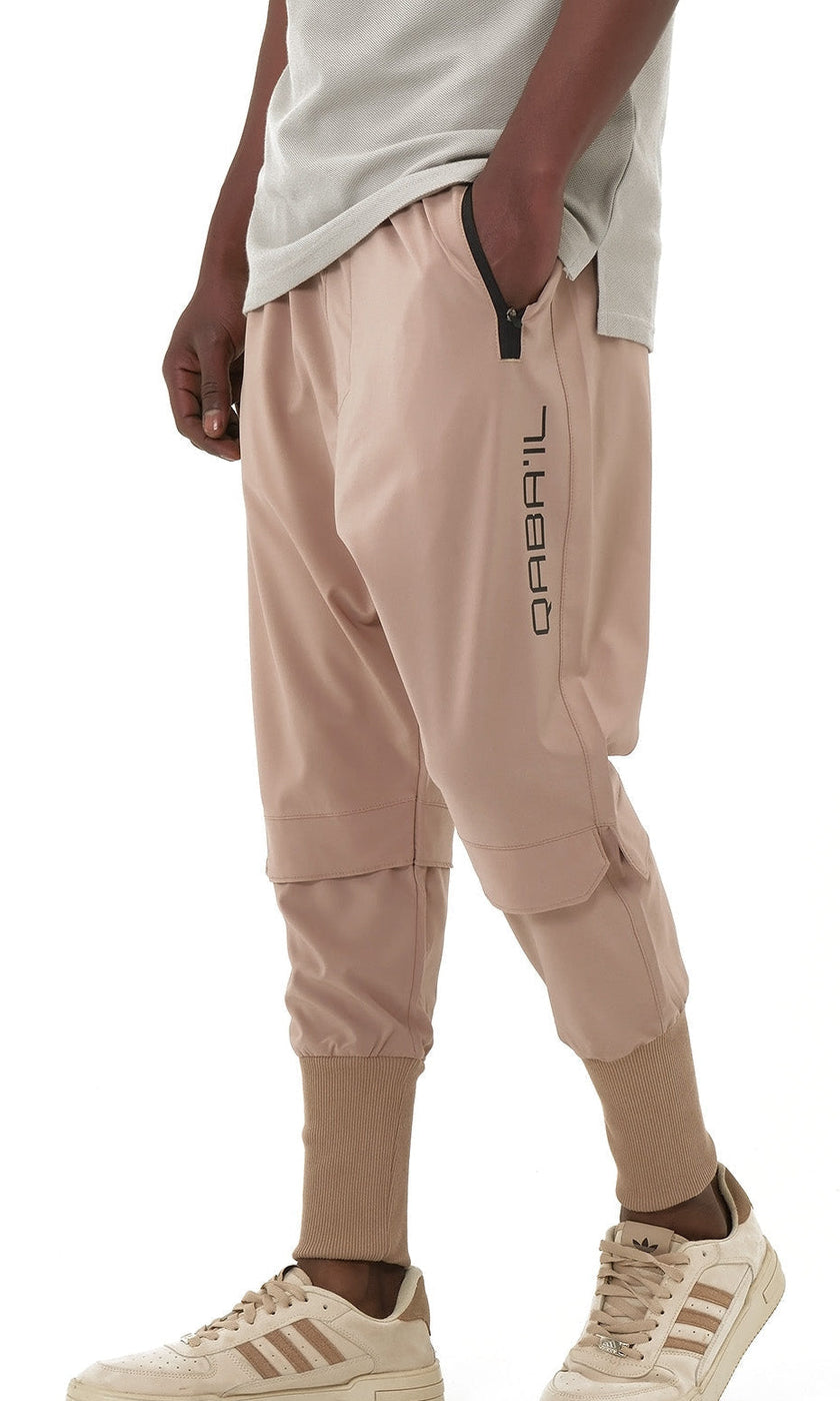 QABA’IL Pantalon Cross Over in Taupe — product photo