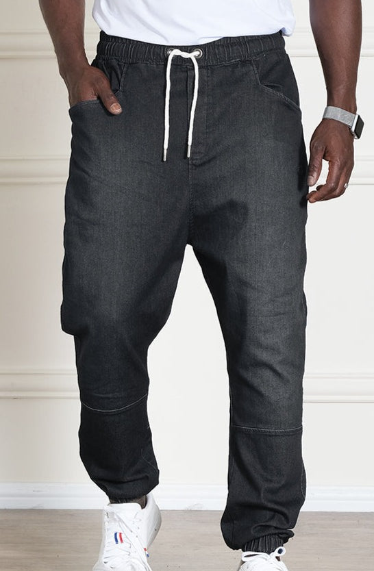 QL Relaxed Fit Stretch Cuffed Jeans in Washed Black - QABA'IL,